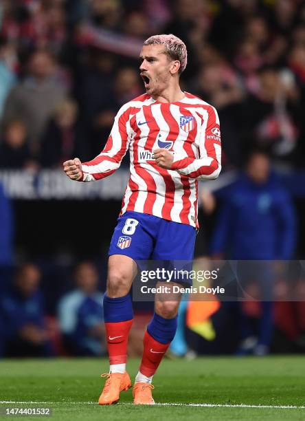 Antoine Griezmann of Atletico de Madrid celebrates after scoring their team's opening goal during the LaLiga Santander match between Atletico de...