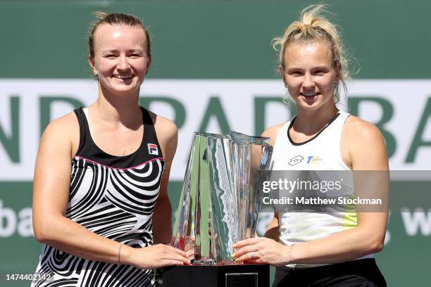 Barbora Krejcijkova and Katerina Siniakova of Czech Republic pose with the winner's trophy after defeating Beatriz Haddad Maia of Brazil and Laura...