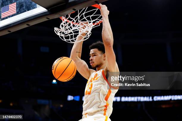 Olivier Nkamhoua of the Tennessee Volunteers dunks the ball against the Duke Blue Devils during the second half of the game in the second round of...