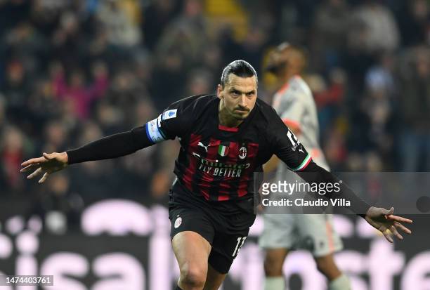 Zlatan Ibrahimovic of AC Milan celebrates with team-mates after scoring the goal during the Serie A match between Udinese Calcio and AC Milan at...