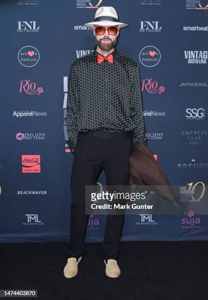 Raimondo Rossi arrives on the red carpet for Los Angeles Fashion Week Powered by Art Hearts Fashion at The Majestic Downtown on March 17, 2023 in Los...