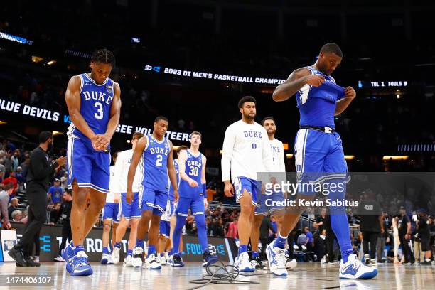 Duke Blue Devils players walk off the court after losing to Tennessee Volunteers in the second round of the NCAA Men's Basketball Tournament at Amway...