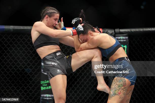 Jennifer Maia knees Casey O'Neill during the Women's Flyweight Bout between Jennifer Maia and Casey O'Neill at The O2 Arena on March 18, 2023 in...