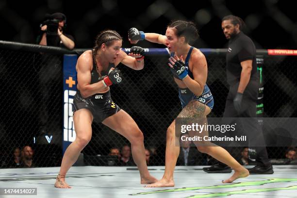 Jennifer Maia looks to evade Casey O'Neill during the Women's Flyweight Bout between Jennifer Maia and Casey O'Neill at The O2 Arena on March 18,...