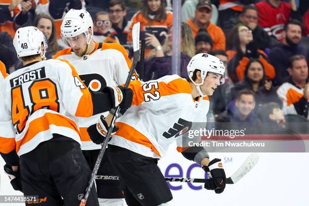 Tyson Foerster of the Philadelphia Flyers looks on after scoring during the second period against the Carolina Hurricanes at Wells Fargo Center on...