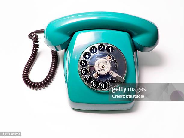 blue telephone, white background - old fashioned telephone stock pictures, royalty-free photos & images