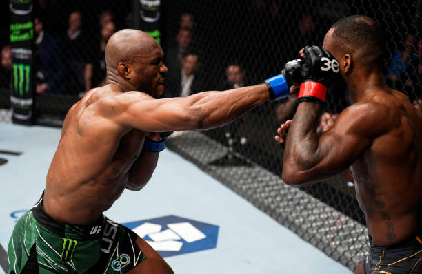 Kamaru Usman of Nigeria punches Leon Edwards of Jamaica in a lightweight fight during the UFC 286 event at The O2 Arena on March 18, 2023 in London,...