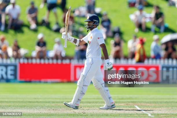 Dimuth Karunaratne of Sri Lanka celebrates his half century during day three of the Second Test Match between New Zealand and Sri Lanka at Basin...