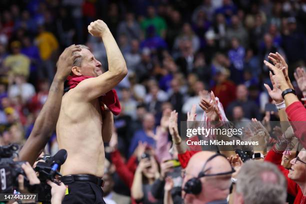 Head coach Eric Musselman of the Arkansas Razorbacks celebrates after defeating the Kansas Jayhawks in the second round of the NCAA Men's Basketball...