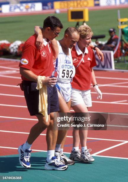 Marco Giungi of Italy competes in the arrival of the 50km Walk of the IAAF World Championships at Commonwealth Stadium on August 11th, 2001 in...