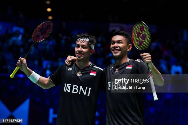 Fajar Alfian and Muhammad Rian Ardianto of Indonesia celebrate the victory in the Men's Doubles semi finals match against He Jiting and Zhou Haodong...