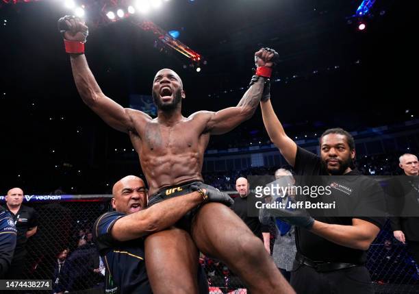 Leon Edwards of Jamaica reacts after defeating Kamaru Usman of Nigeria in the UFC welterweight championship fight during the UFC 286 event at The O2...