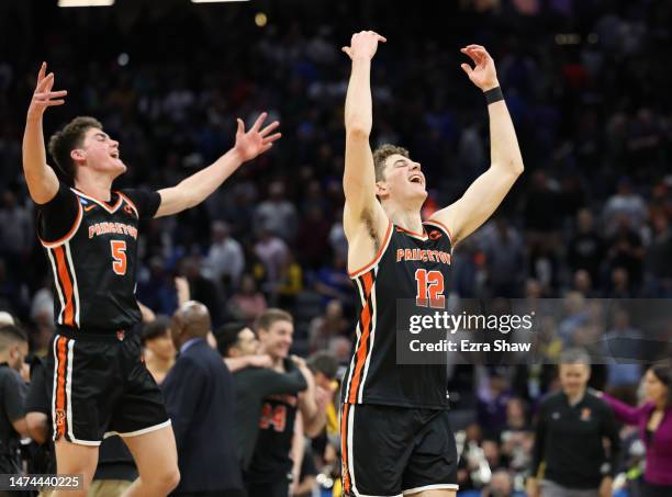 Caden Pierce and Jack Scott of the Princeton Tigers react after the 78-63 victory over the Missouri Tigers in the second round of the NCAA Men's...