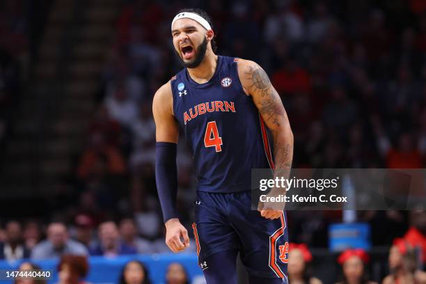 Johni Broome of the Auburn Tigers reacts during the first half against the Houston Cougars in the second round of the NCAA Men's Basketball...
