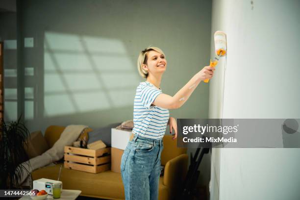 renovation of an apartment - painting wall stock pictures, royalty-free photos & images