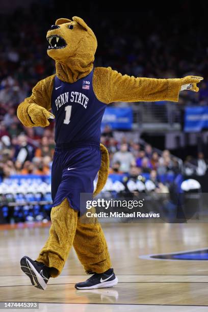 The Penn State Nittany Lions mascot peforms during the first half against the Texas Longhorns in the second round of the NCAA Men's Basketball...