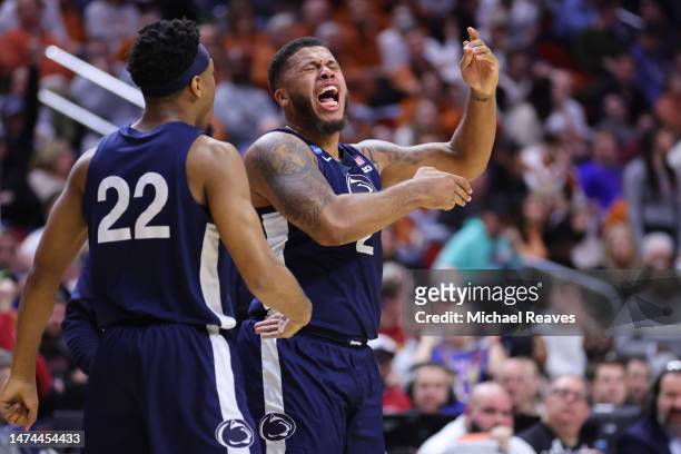 Myles Dread of the Penn State Nittany Lions reacts with Jalen Pickett after his made three point basket against the Texas Longhorns during the second...