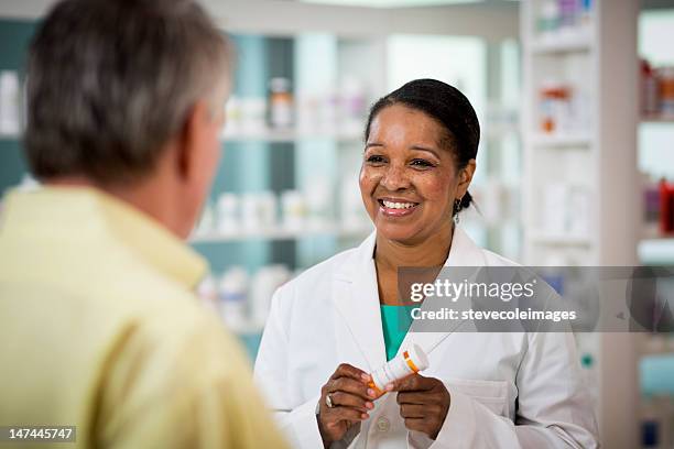 prescription - pharmacist and patient stock pictures, royalty-free photos & images