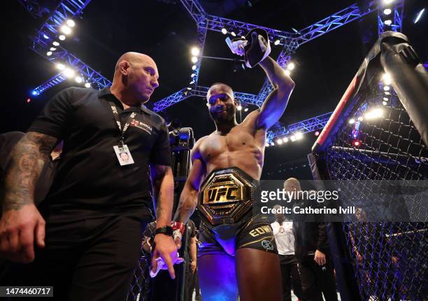 Leon Edwards leaves the ring wearing the belt after winning the Welterweight Title Bout between Leon Edwards and Kamaru Usman at The O2 Arena on...
