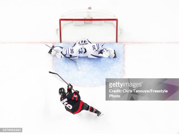 Matt Murray of the Toronto Maple Leafs makes a pad save against Jakob Chychrun of the Ottawa Senators during the shootout round of the game at...