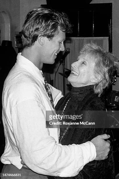 Academy Award-winning actress Cloris Leachman and her son, actor Morgan England dance at a birthday party for award-winning actress Nicollette...