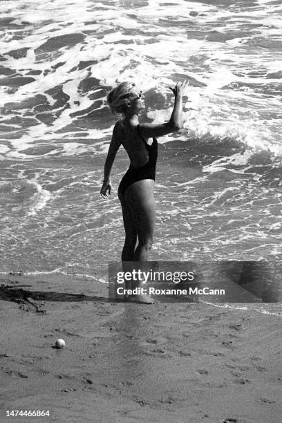 English-born American actress Nicollette Sheridan enjoys the beach in 1996 in Malibu, California.