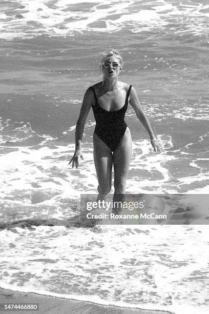 English-born American actress Nicollette Sheridan enjoys the beach in 1996 in Malibu, California.