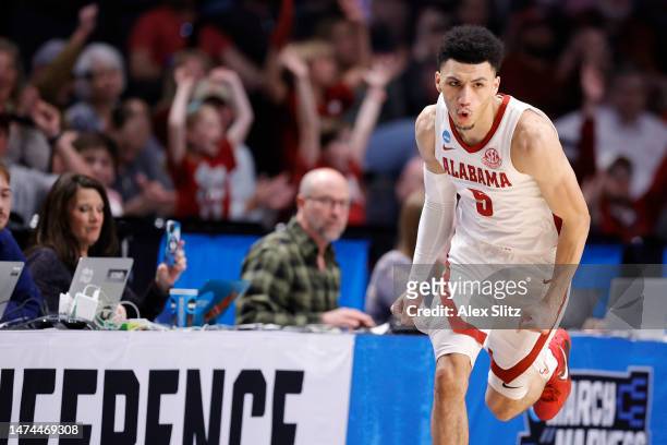Jahvon Quinerly of the Alabama Crimson Tide celebrates after a three-point basket during the second half against the Maryland Terrapins in the second...