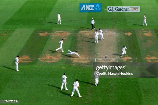 Michael Bracewell of New Zealand attempts to run out Kusal Mendis of Sri Lanka during day three of the Second Test Match between New Zealand and Sri...