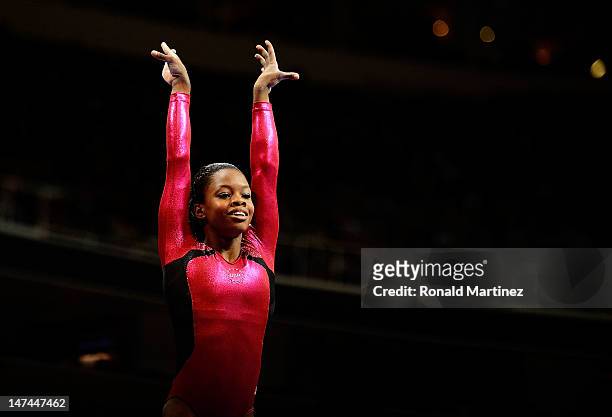 Gabrielle Douglas reacts after competing on the beam during day 2 of the 2012 U.S. Olympic Gymnastics Team Trials at HP Pavilion on June 28, 2012 in...