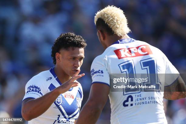 Hayze Perham of the Bulldogs celebrates scoring a try with team mates during the round three NRL match between Canterbury Bulldogs and Wests Tigers...