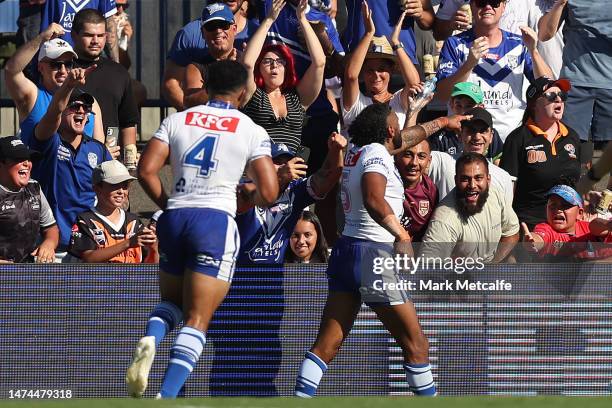 Josh Addo-Carr of the Bulldogs celebrates scoring a try during the round three NRL match between Canterbury Bulldogs and Wests Tigers at Belmore...