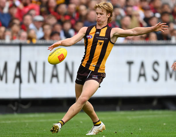 Cam Mackenzie of the Hawks kicks during the round one AFL match between Hawthorn Hawks and Essendon Bombers at Melbourne Cricket Ground, on March 19...