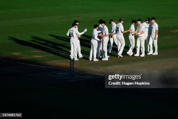 New Zealand players shake hands at the conclusion of during day three of the Second Test Match between New Zealand and Sri Lanka at Basin Reserve on...