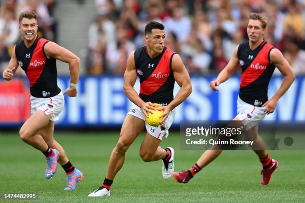 Dylan Shiel of the Bombers kicks during the round one AFL match between Hawthorn Hawks and Essendon Bombers at Melbourne Cricket Ground, on March 19...