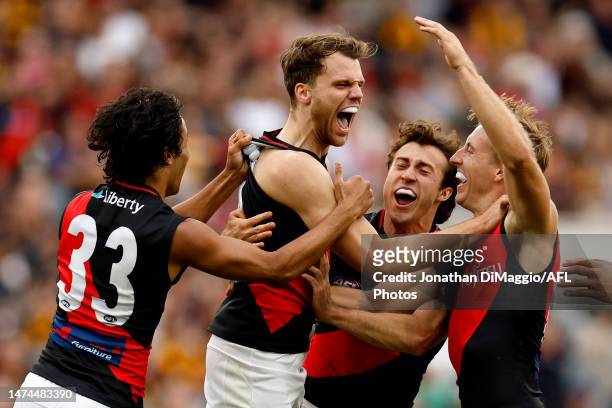 Jordan Ridley of the Bombers celebrates a goal during the round one AFL match between Hawthorn Hawks and Essendon Bombers at Melbourne Cricket...
