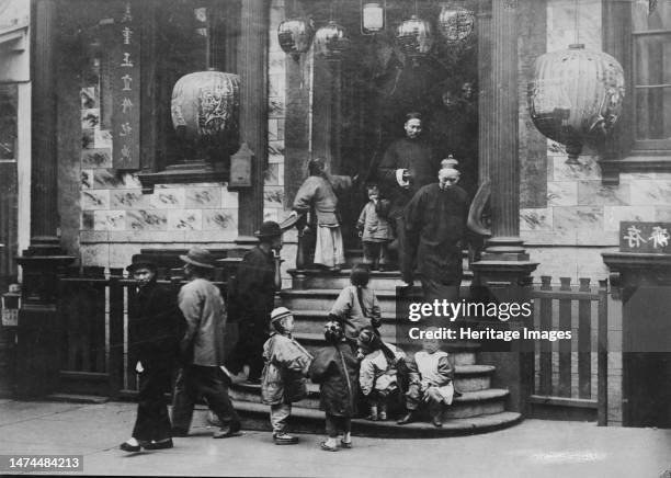 In front of the Joss House, Chinatown, San Francisco, between 1896 and 1906. Creator: Arnold Genthe.