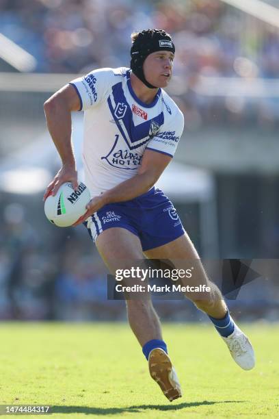 Matt Burton of the Bulldogs looks to pass during the round three NRL match between Canterbury Bulldogs and Wests Tigers at Belmore Sports Ground on...