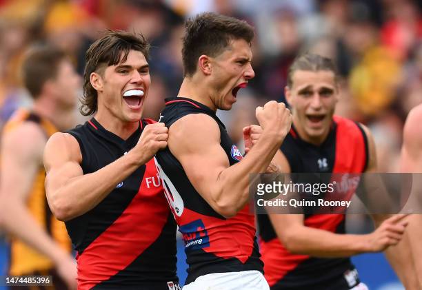 Archie Perkins of the Bombers celebrates kicking a goal during the round one AFL match between Hawthorn Hawks and Essendon Bombers at Melbourne...