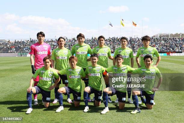 Gainare Tottori players line up for the team photos prior to the J.LEAGUE Meiji Yasuda J3 3rd Sec. Match between Gainare Tottori and Ehime FC at Axis...