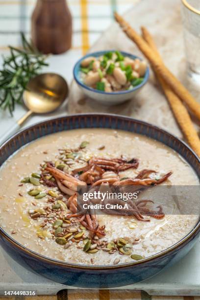 cannellini bean soup with squid - velouté sauce stock pictures, royalty-free photos & images