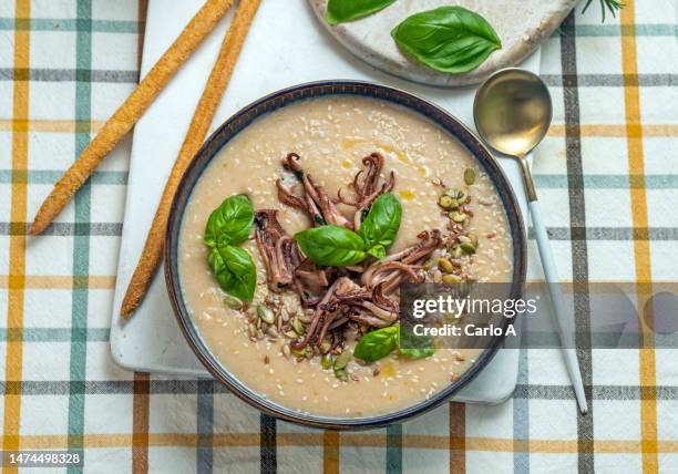 cannellini bean soup with squid - velouté sauce stock pictures, royalty-free photos & images