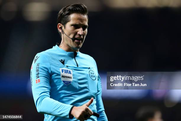 Match Referee Jose Luis Munuera Montero reacts during the LaLiga Santander match between Atletico de Madrid and Valencia CF at Civitas Metropolitano...