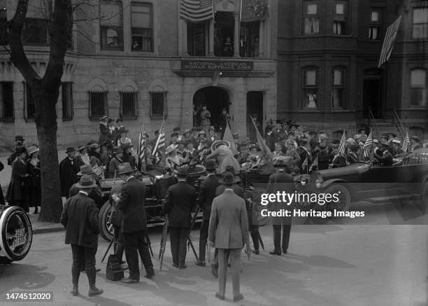 Rankin, Jeanette I.E. Jeannette, Rep. From Montana, 1917-1919 in Car Surrounded By Suffragettes, 1917. Creator: Harris & Ewing.