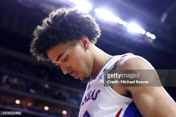 Jalen Wilson of the Kansas Jayhawks reacts after losing to the Arkansas Razorbacks in the second round of the NCAA Men's Basketball Tournament at...