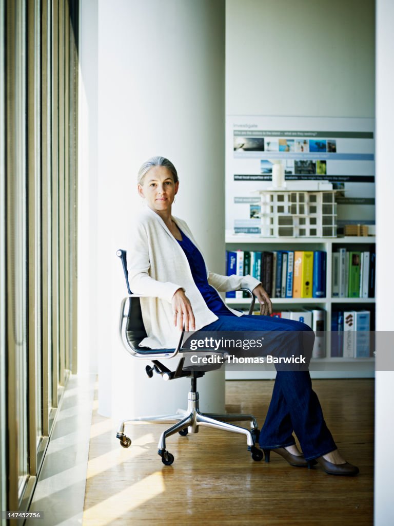 Portrait of mature businesswoman sitting in office