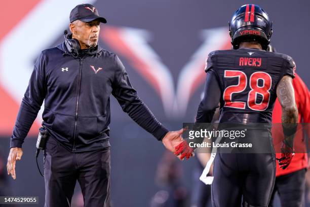 Head coach Rod Woodson and linebacker C.J. Avery of the Las Vegas Vipers slap hands before their game against the Orlando Guardians at Cashman Field...