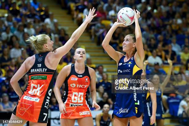 Cara Koenen of the Lightning shoots during the round one Super Netball match between the Sunshine Coast Lightning and the Giants Netball at...