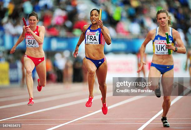 Christine Arron of France competes in the Women's 4x100 Metres Relay Semi Finals during day four of the 21st European Athletics Championships at the...