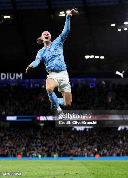 Erling Haaland of Manchester City celebrates scoring the teams first goal during the Emirates FA Cup Quarter Final match between Manchester City and...